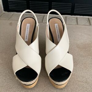 Diane von Furstenberg.  Size 61/2. Ivory. Wood wedge